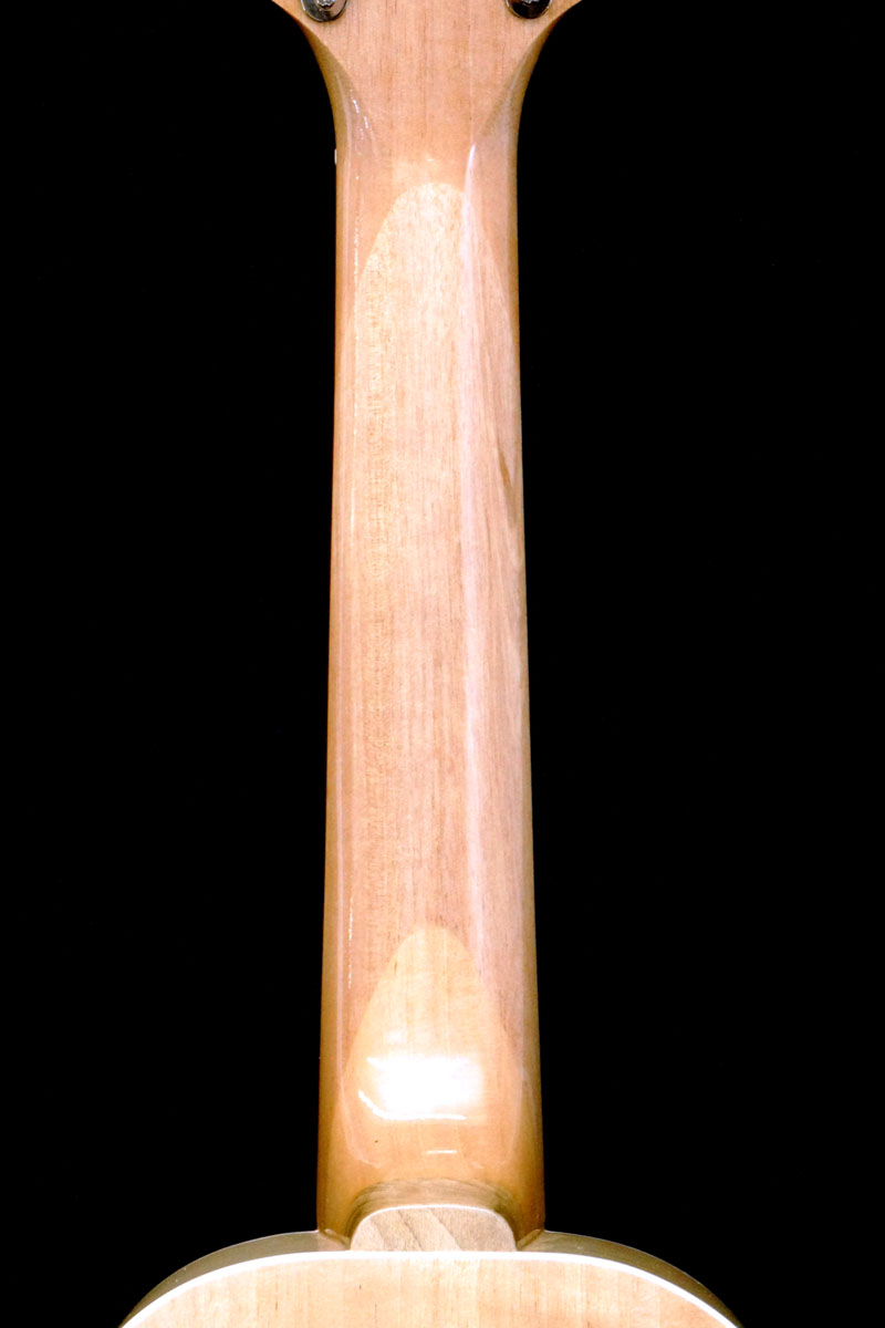 �߂�